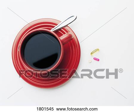 Pills beside a cup of tea View Large Photo Image Stock Photography - Pills beside a cup of tea. Fotosearch