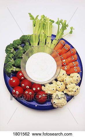 Stock Image - Platter of vegetables with eyes. Fotosearch
