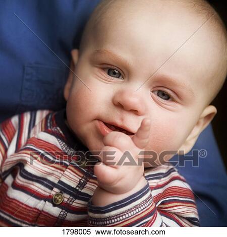 Portrait of a baby pointing View Large Photo Image Stock Photography - Portrait of a baby pointing. Fotosearch