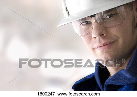 Stock Photo - Portrait of a blue collar worker. Fotosearch