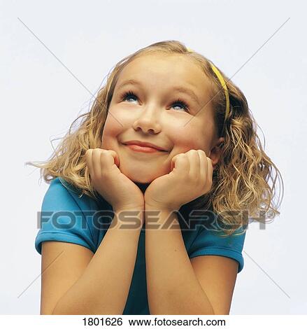 Stock Photograph - Portrait of smiling girl. Fotosearch