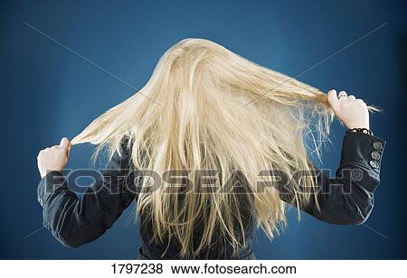 Stock Photo - Pulling her hair out. Fotosearch