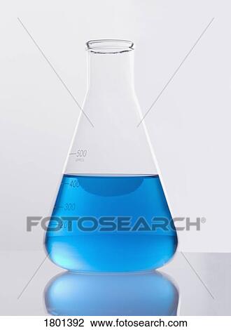 Single glass flask with blue solution View Large Photo Image Stock Image - Single glass flask with blue solution. Fotosearch