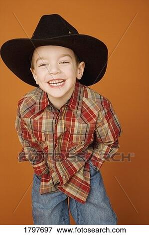 Stock Photo - Smiling cowboy. Fotosearch