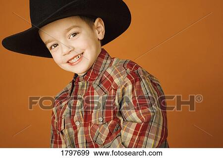 Smiling cowboy View Large Photo Image Stock Photo - Smiling cowboy. Fotosearch
