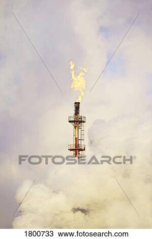 Stock Image - Smoke stack with fire. Fotosearch