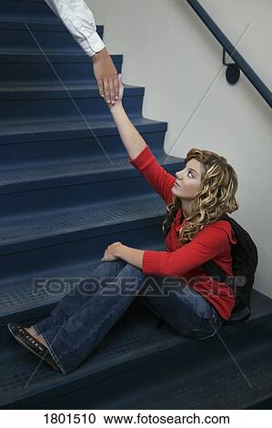 Someone reaching to help girl up View Large Photo Image Stock Image - Someone reaching to help girl up. Fotosearch