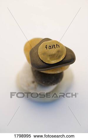 Stock Photography - Stack of stones representing faith. Fotosearch