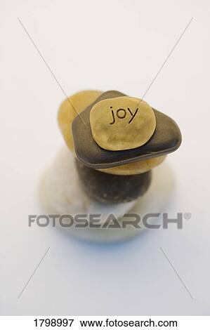 Stack of stones representing joy View Large Photo Image Stock Photo - Stack of stones representing joy. Fotosearch