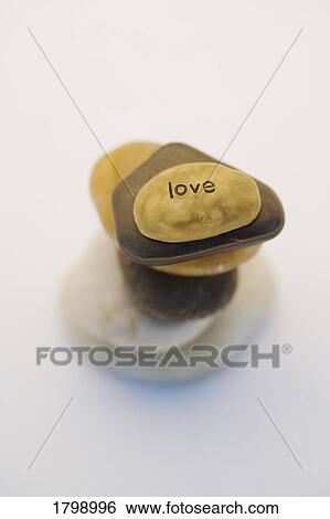 Stack of stones representing love View Large Photo Image Stock Photograph - Stack of stones representing love. Fotosearch