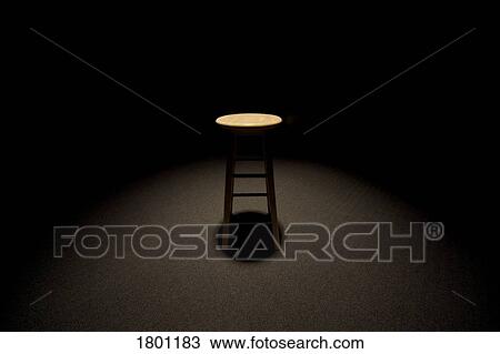 Stock Image - Stool in the spotlight. Fotosearch