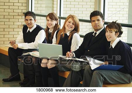 Students in uniform, studying View Large Photo Image Stock Photo - Students in uniform, studying. Fotosearch