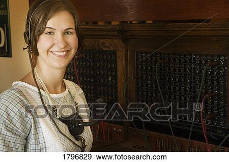 Switchboard operator of the past View Large Photo Image Stock Photo - Switchboard operator of the past. Fotosearch