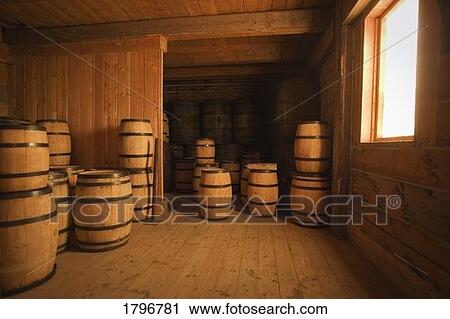 Traditional barrels in a wooden storage room View Large Photo Image Stock Image - Traditional barrels in a wooden storage room. Fotosearch