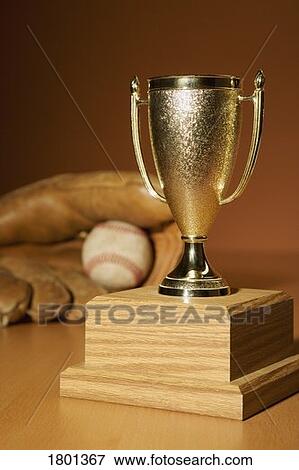 Trophy with baseball glove and ball View Large Photo Image Stock Photo - Trophy with baseball glove and ball. Fotosearch