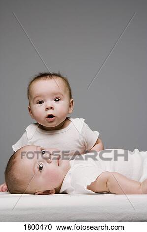 Two babies View Large Photo Image Stock Image - Two babies. Fotosearch