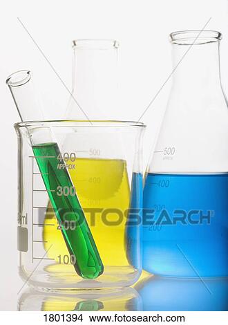 Two flasks and test tube with colorful solutions View Large Photo Image Picture - Two flasks and test tube with colorful solutions. Fotosearch