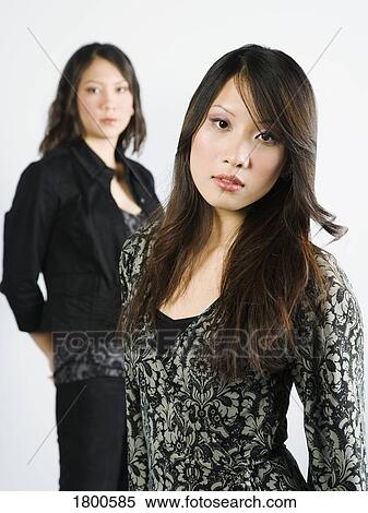 Two young adult women View Large Photo Image Stock Photography - Two young adult women. Fotosearch