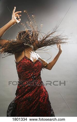 Picture - Woman dancing in fancy dress. Fotosearch