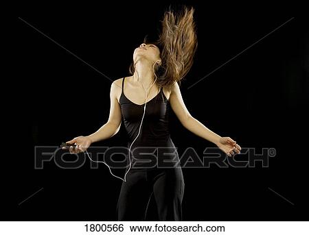 Stock Photograph - Woman dancing. Fotosearch