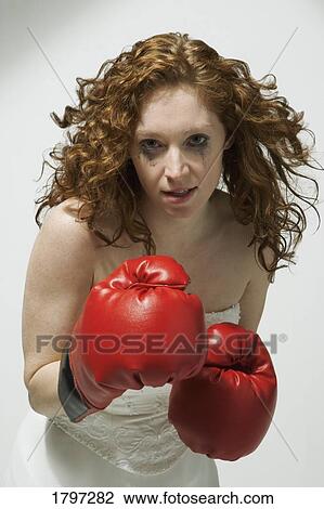 Stock Image - Woman fights back. Fotosearch