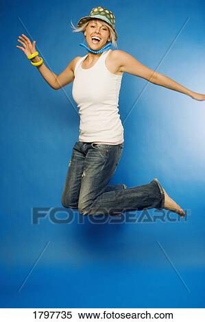 Stock Photography - Woman jumping. Fotosearch