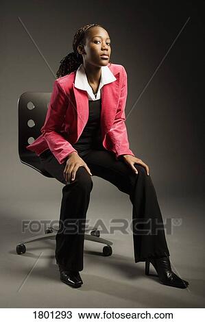Woman on chair View Large Photo Image Stock Image - Woman on chair . Fotosearch