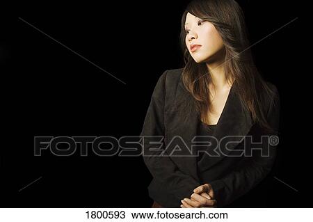 Woman posing in blazer View Large Photo Image Stock Image - Woman posing in blazer. Fotosearch