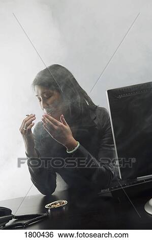 Stock Photograph - Woman smoking . Fotosearch