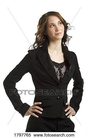 Woman standing with her hands on her hips View Large Photo Image Stock Photography - Woman standing with her hands on her hips. Fotosearch