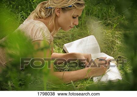 Stock Photo - Woman studying. Fotosearch