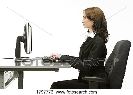 Stock Image - Woman using a computer. Fotosearch