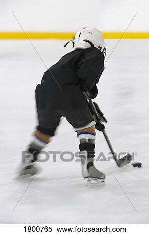 Stock Photography - Young Hockey Player. Fotosearch