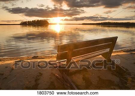 A bench overlooking Astotin Lake at Elk Island National Park, Alberta, Canada View Large Photo Image Stock Image - A bench overlooking Astotin Lake at Elk Island National Park, Alberta, Canada . Fotosearch