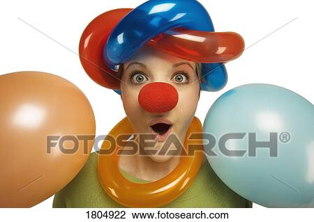 Stock Image - A clown with balloons. Fotosearch