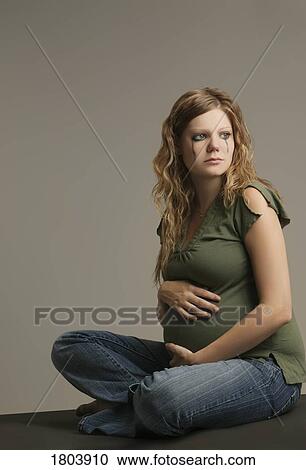 A pensive pregnant woman View Large Photo Image Stock Image - A pensive pregnant woman. Fotosearch