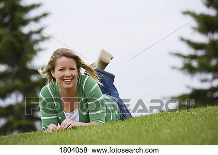 Stock Photo - A woman smiling . Fotosearch