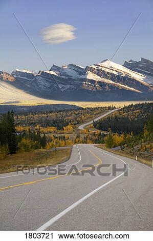 Stock Image - Autumn evening on Hwy 11, Kootenay Plains, Alberta, Canada . Fotosearch