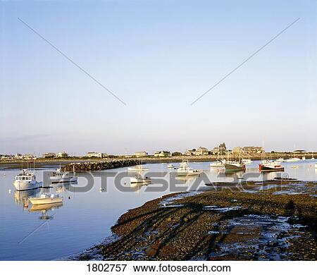 Stock Photo - Boats moored at harbour. Fotosearch