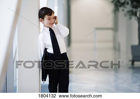 Boy dressed up like businessman View Large Photo Image Stock Image - Boy dressed up like businessman. Fotosearch
