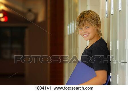 Child with binder View Large Photo Image Stock Image - Child with binder. Fotosearch
