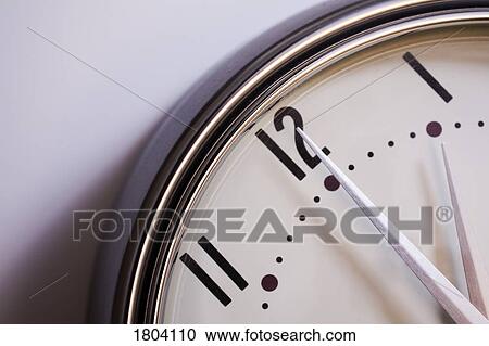 Stock Image - Close up of clock. Fotosearch