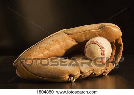 Closeup of baseball and glove View Large Photo Image Stock Image - Closeup of baseball and glove. Fotosearch