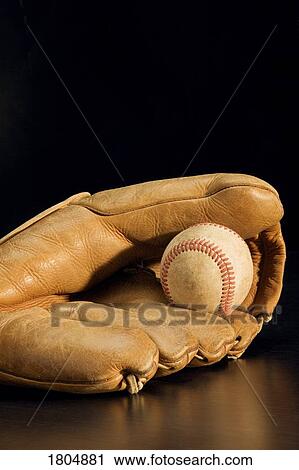 Closeup of baseball and leather glove View Large Photo Image Stock Image - Closeup of baseball and leather glove. Fotosearch