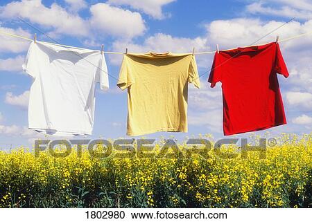 Clothes hanging to dry on clothesline Stock Image | 1802980 | Fotosearch