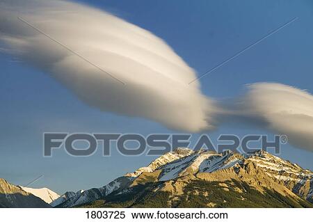 Clouds above mountain peaks, Kootenay Plains, Alberta, Canada View Large Photo Image Stock Photography - Clouds above mountain peaks, Kootenay Plains, Alberta, Canada . Fotosearch