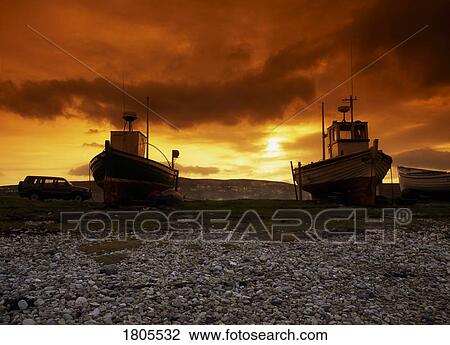 Co Donegal, Magheraroarty, Boats On The Beach, Ireland View Large Photo Image Stock Image - Co Donegal, Magheraroarty, Boats On The Beach, Ireland. Fotosearch