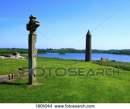 Picture - Co Fermanagh, Lower Lough Erne, Devenish Island, 12c Round Tower, Augustinian Abbey, Ireland. Fotosearch