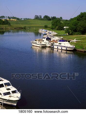 Co Fermanagh, Upper Lough Erne, Cruisers At Carrybridge, Ireland View Large Photo Image Stock Image - Co Fermanagh, Upper Lough Erne, Cruisers At Carrybridge, Ireland. Fotosearch