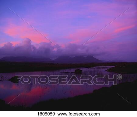Co Galway, Connemara, Twelve Bens from the Bog Road at Roundstone, Ireland View Large Photo Image Stock Photo - Co Galway, Connemara, Twelve Bens from the Bog Road at Roundstone, Ireland. Fotosearch